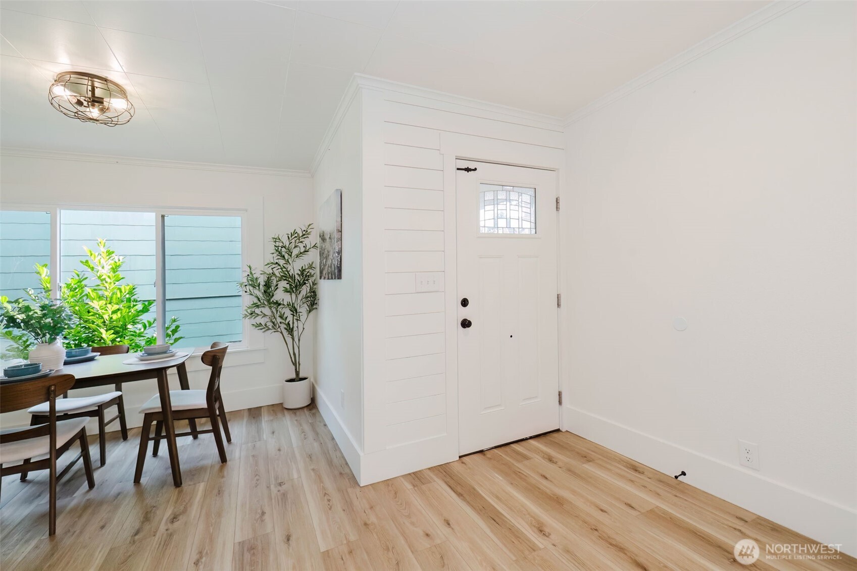 1540 7th Street Bremerton, WA 98337 - Photo 4 of 36 a view of a livingroom with furniture and wooden floor