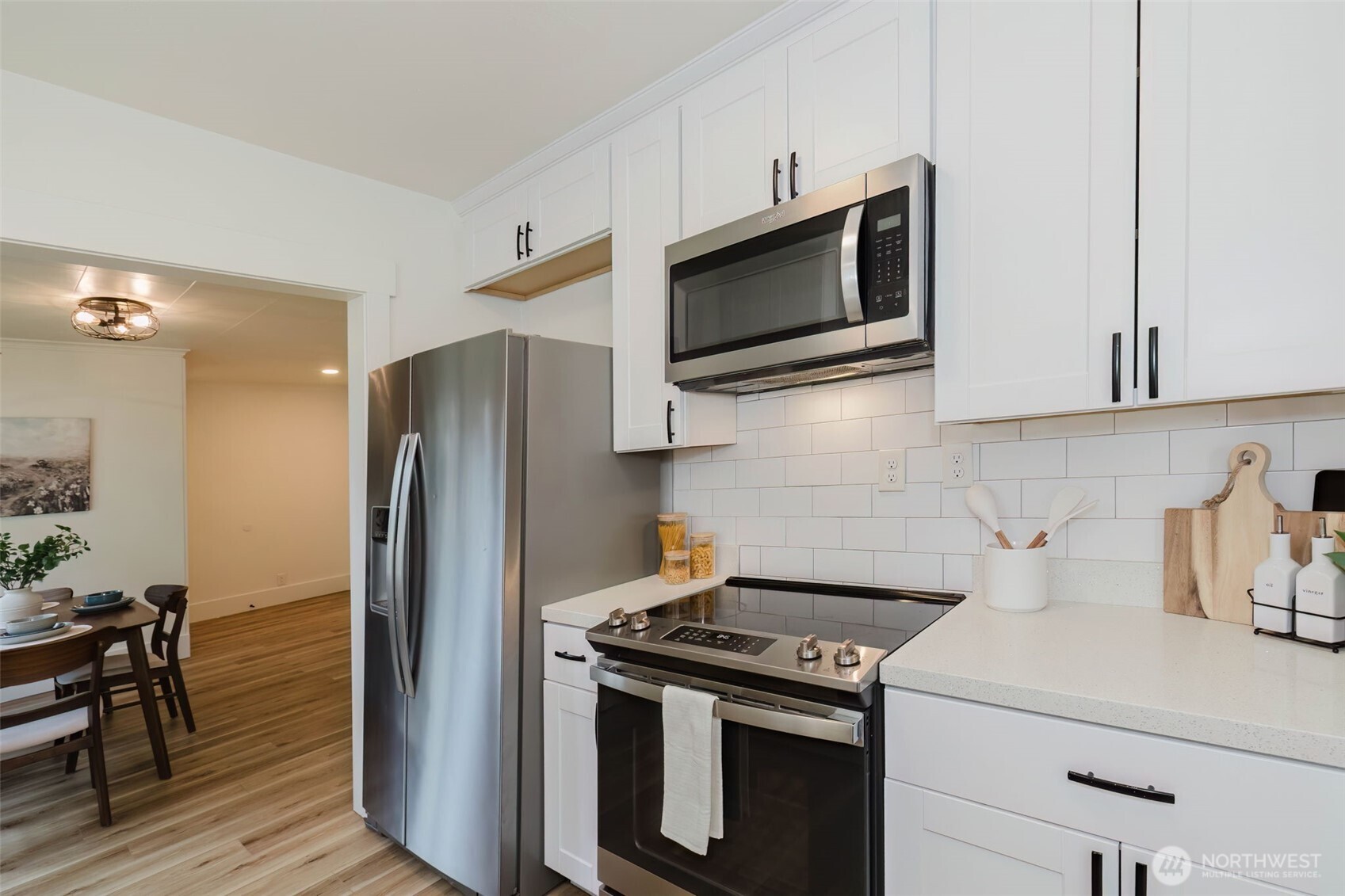 1540 7th Street Bremerton, WA 98337 - Photo 10 of 36 a kitchen with a stove and a microwave