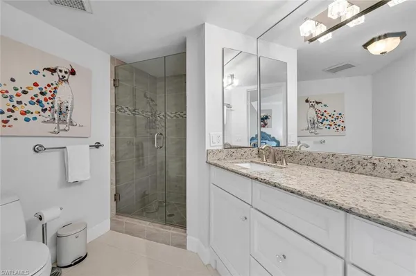 a view of a balcony with furniture