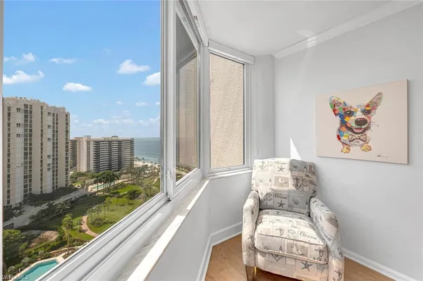a bathroom with a granite countertop sink mirror and toilet