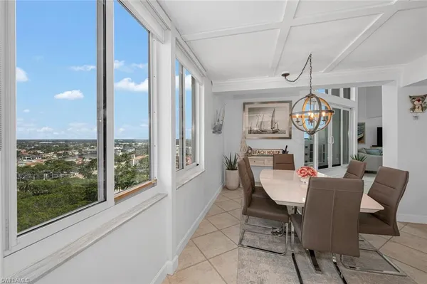 a kitchen with stainless steel appliances kitchen island granite countertop a sink and cabinets