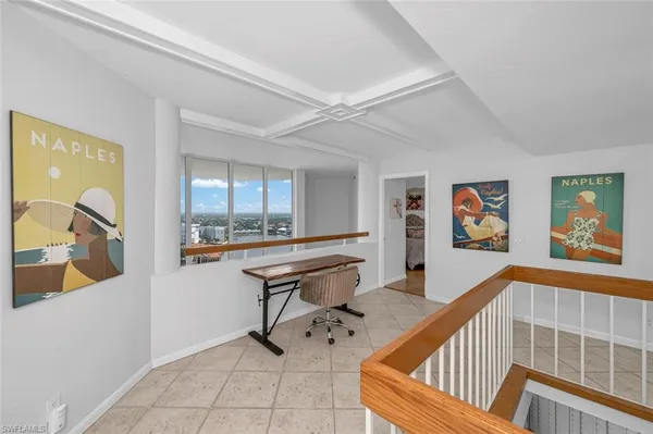 a bedroom with bed and window