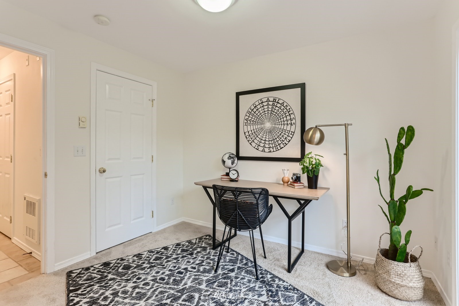 1512 Northwest 57th Street, Unit D Seattle, WA 98107 - Photo 22 of 29 a view of a workspace with furniture