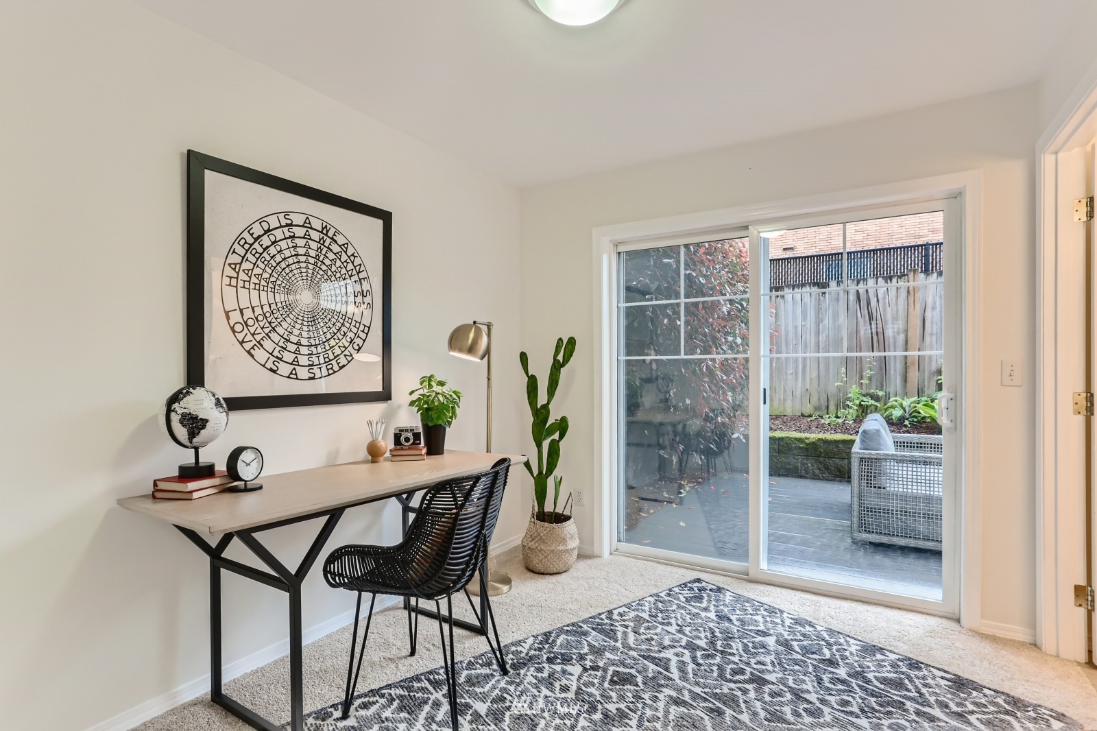 1512 Northwest 57th Street, Unit D Seattle, WA 98107 - Photo 23 of 29 a dining room with furniture and front door