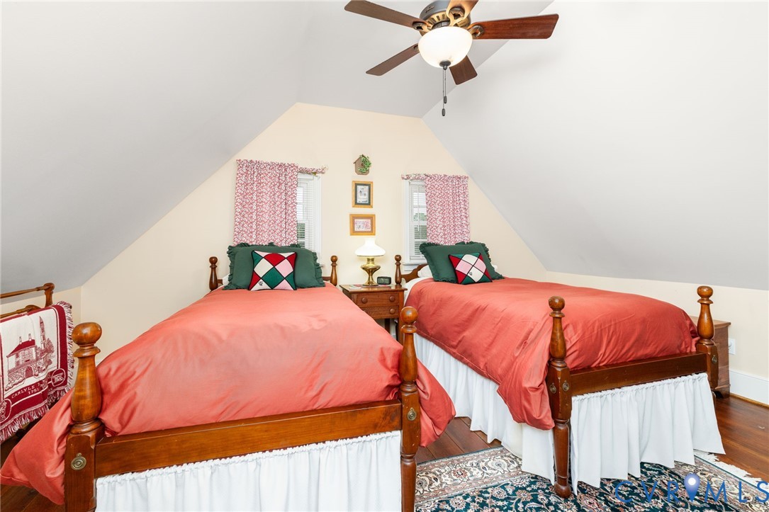 2284 Wallace's Bridge Road Lunenburg, VA 23952 - Photo 32 of 89 Sloped ceiling design with a ceiling fan, two wind