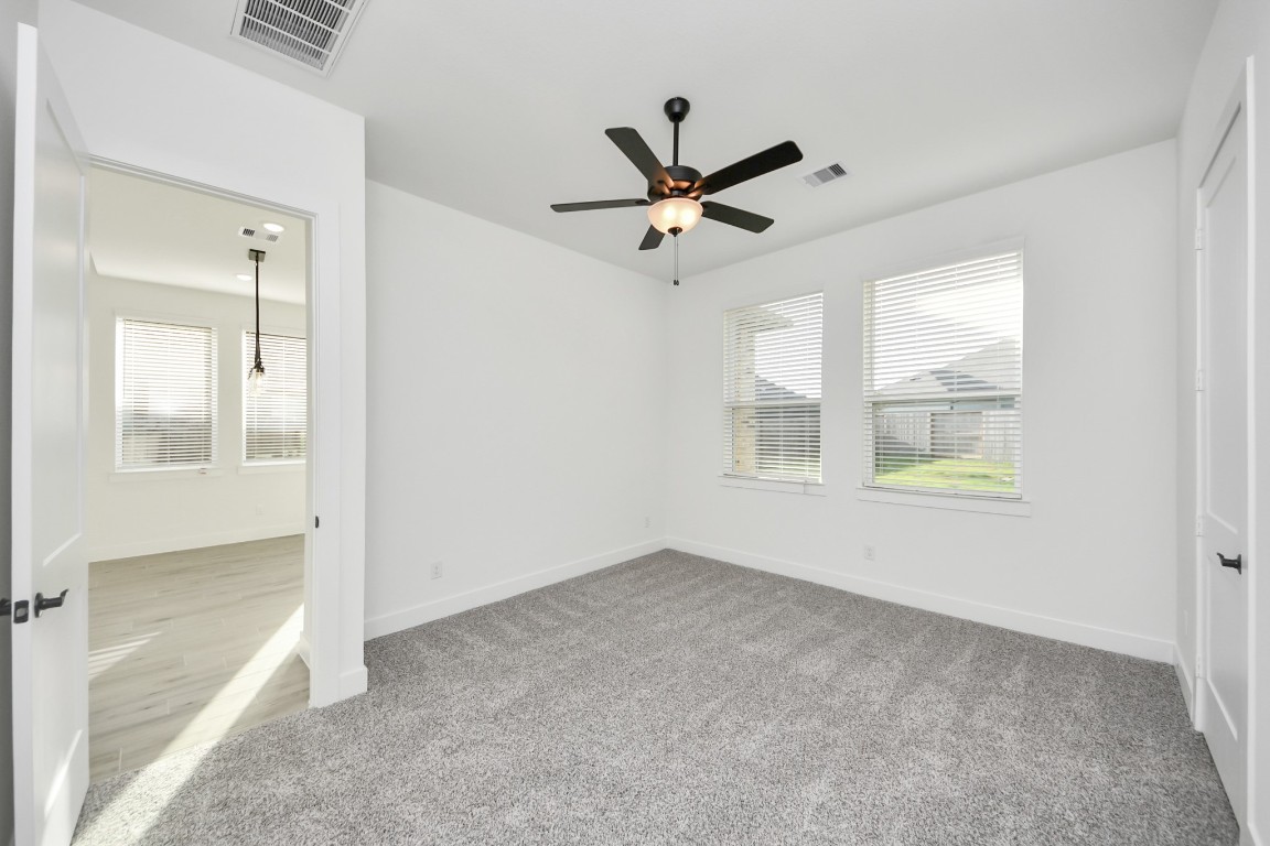 9519 Chateau Hill Manvel, TX 77578 - Photo 14 of 35 a view of an empty room and window