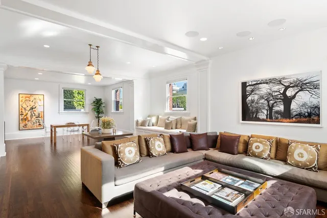 a kitchen with a sink stove top oven and cabinets