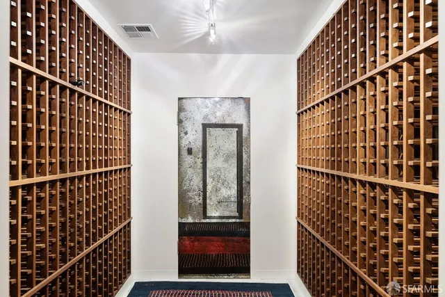 a view of a patio with table and chairs and potted plants