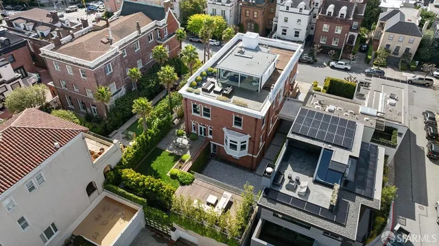 an aerial view of a building with outdoor space