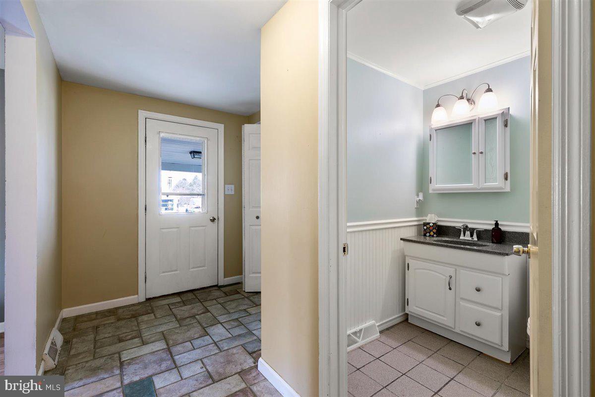 579 Crosswinds Drive Lititz, PA 17543 - Photo 36 of 64 Powder room/mudroom/Laundry room off kitchen