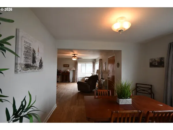 a view of a livingroom with furniture and a chandelier