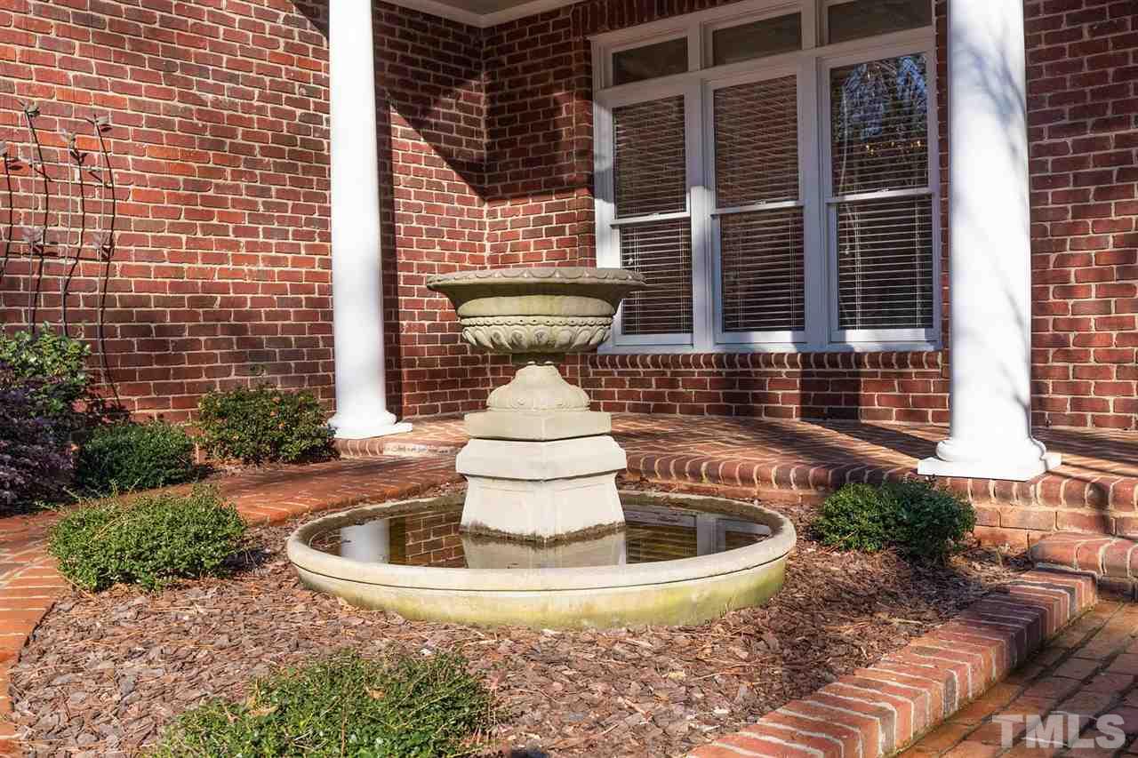 5220 Deergrass Court Raleigh, NC 27613 - Photo 3 of 25 a view of statue in a balcony