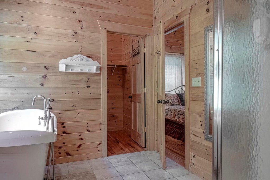 781 Mangum's Trail Blue Ridge, GA 30513 - Photo 39 of 65 Large Walk-In Closet off of Primary Suite Bathroom