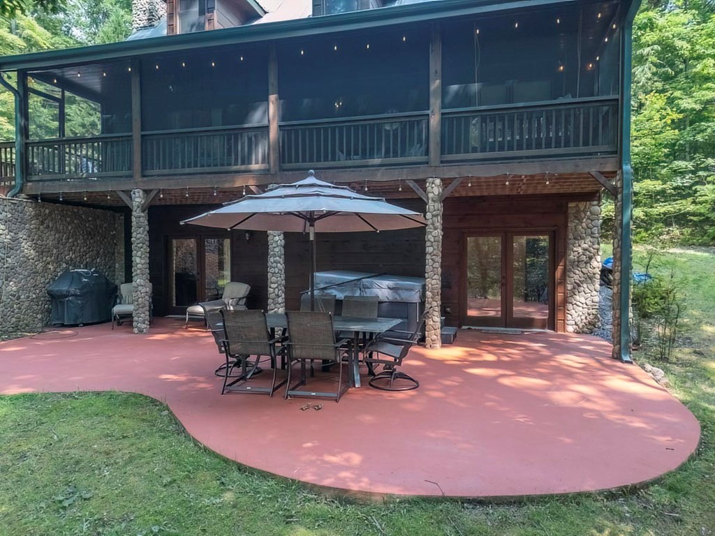 781 Mangum's Trail Blue Ridge, GA 30513 - Photo 47 of 65 a patio with table and chairs