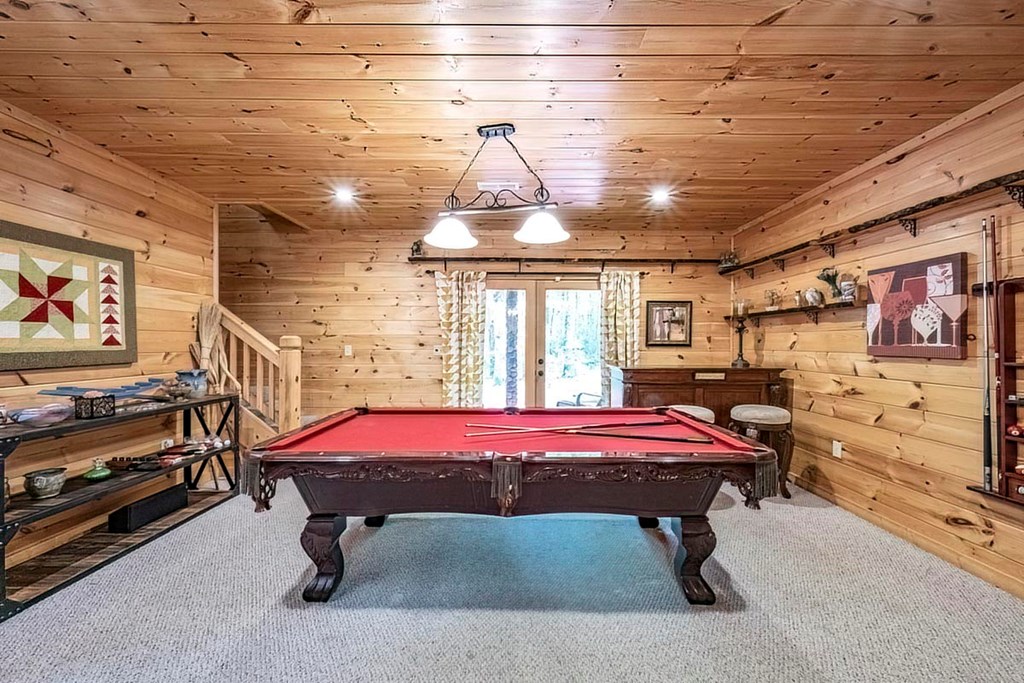 781 Mangum's Trail Blue Ridge, GA 30513 - Photo 49 of 65 a bedroom with furniture and window