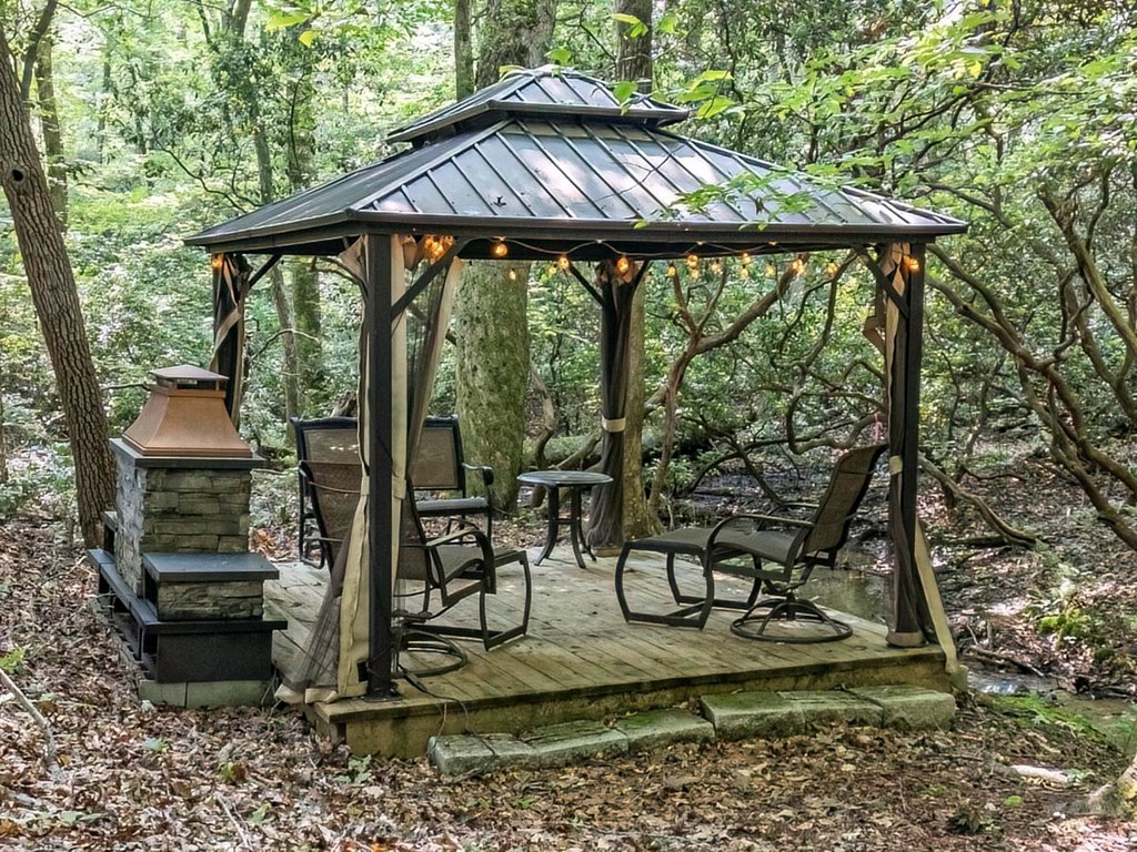 781 Mangum's Trail Blue Ridge, GA 30513 - Photo 62 of 65 a patio with table and chairs