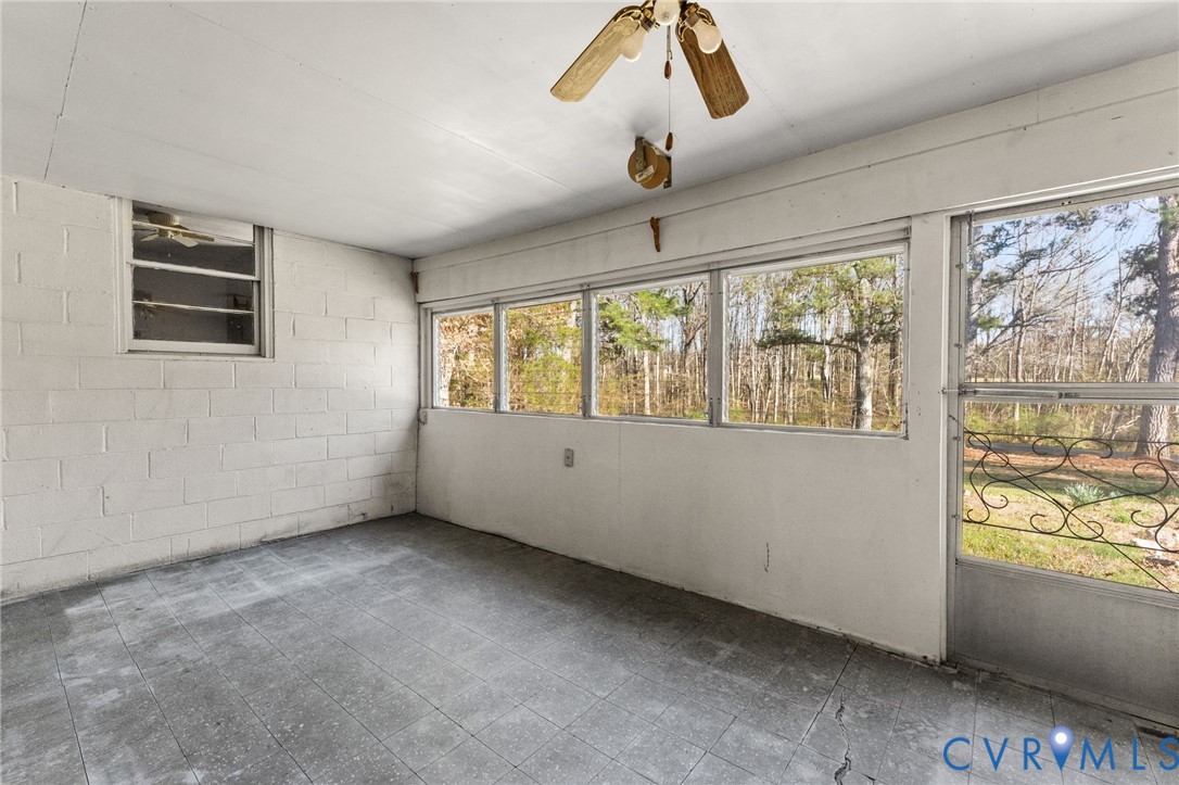 19161 Hollowing Creek Road Beaverdam, VA 23015 - Photo 15 of 27 a view of an empty room with a window