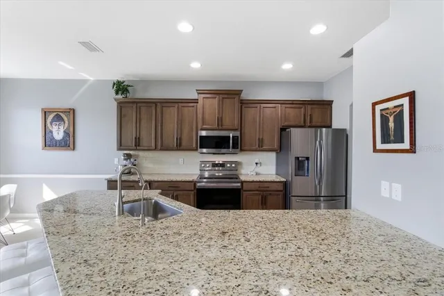 $600,000 | 6 Arena Lake Drive, Palm Coast, FL 32137