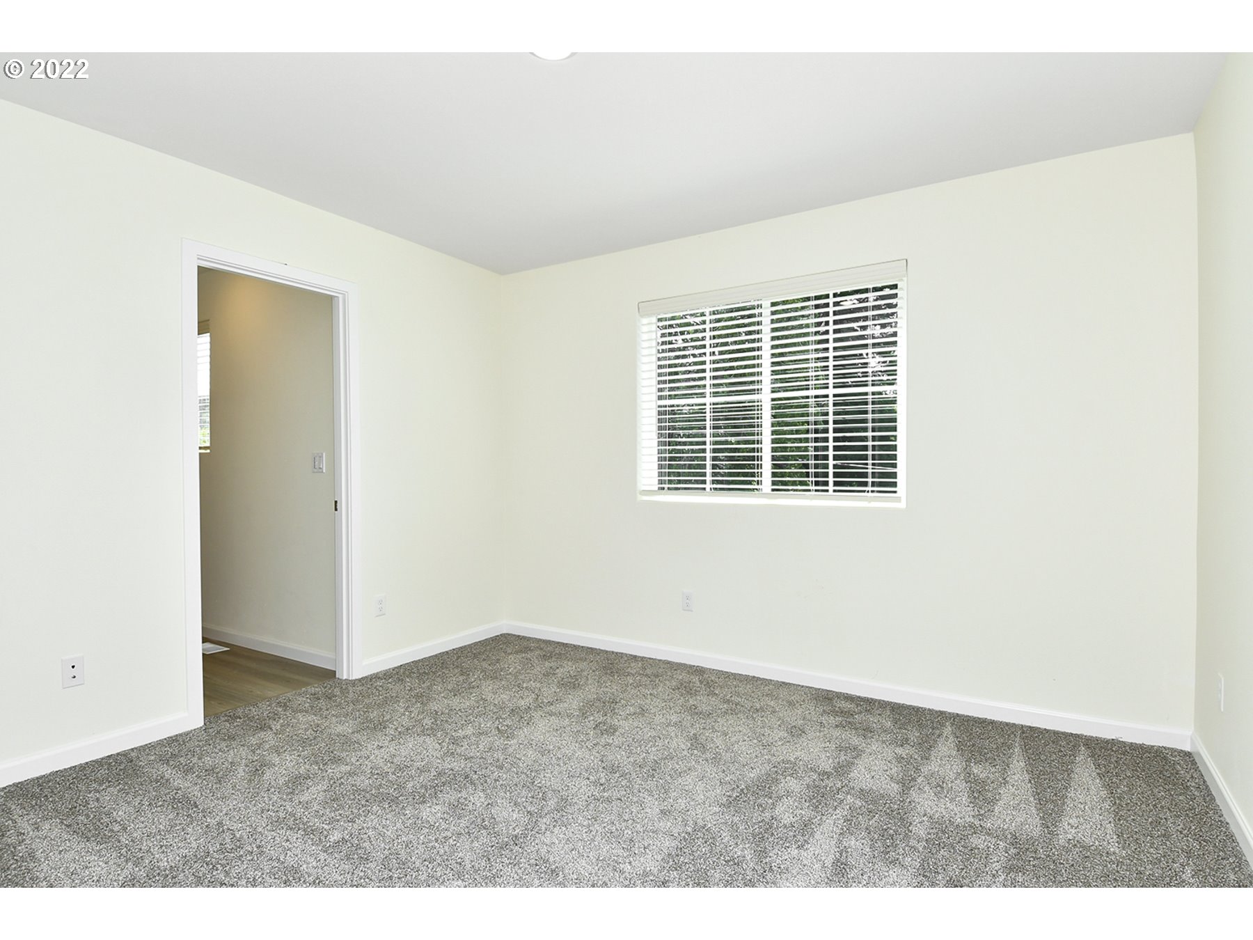 4133 Southwest Hartley Avenue Gresham, OR 97080 - Photo 7 of 10 an empty room with windows