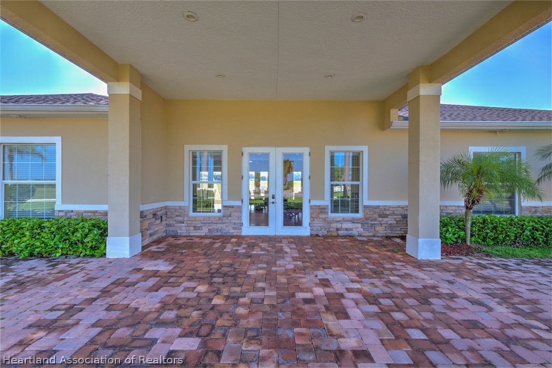 1388 Stone Circle Sebring, FL 33870 - Photo 16 of 31 a view of a house with backyard and garden