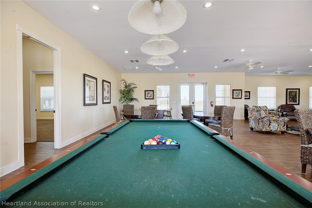 1388 Stone Circle Sebring, FL 33870 - Photo 22 of 31 a living room with furniture and a table