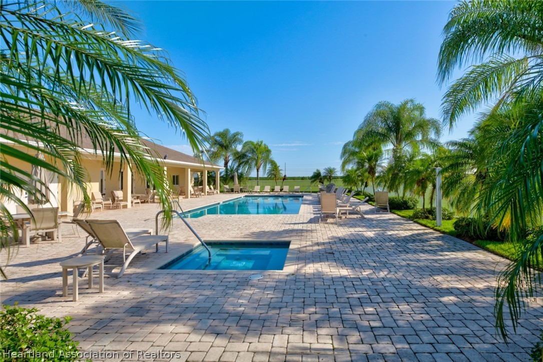 1388 Stone Circle Sebring, FL 33870 - Photo 29 of 31 a view of a house with a yard