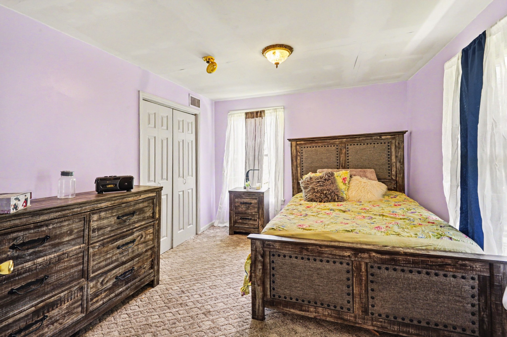 1241 Butler Bridge Road Portland, TN 37148 - Photo 9 of 15 a bedroom with a bed and a dresser