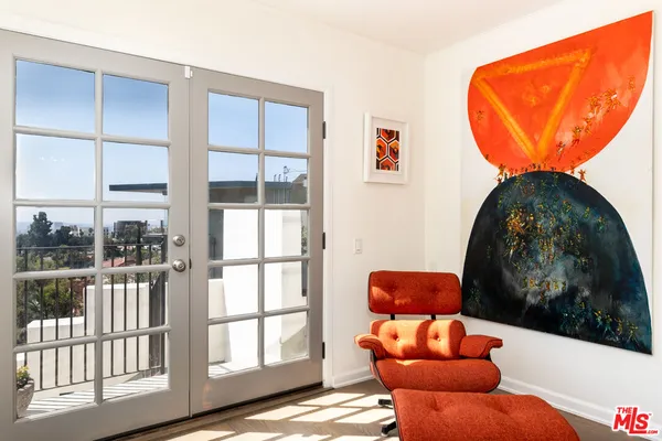 a room with furniture and a window
