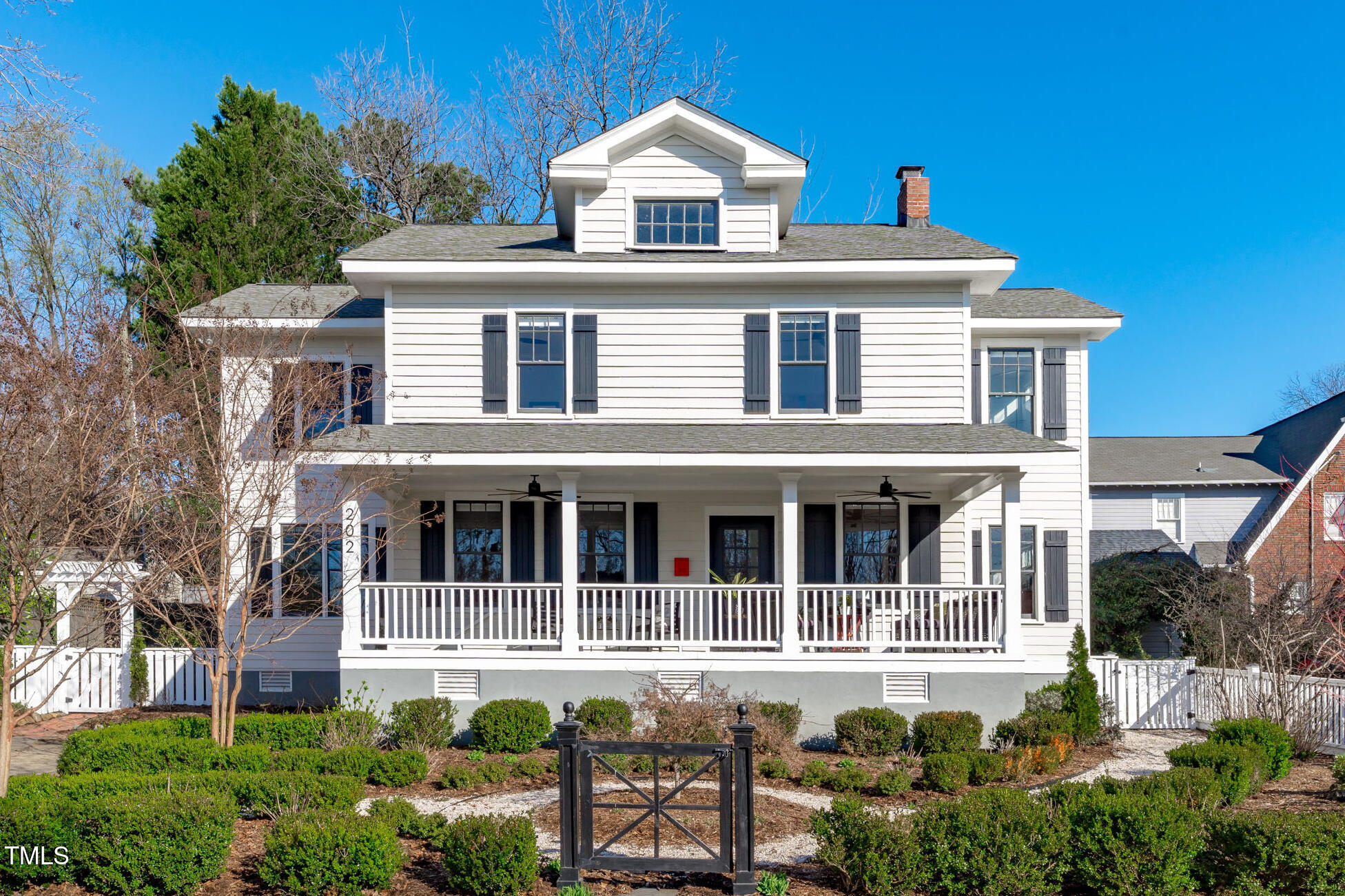 202 Duncan Street Raleigh, NC 27608 - Photo 1 of 46 a front view of a house with a yard