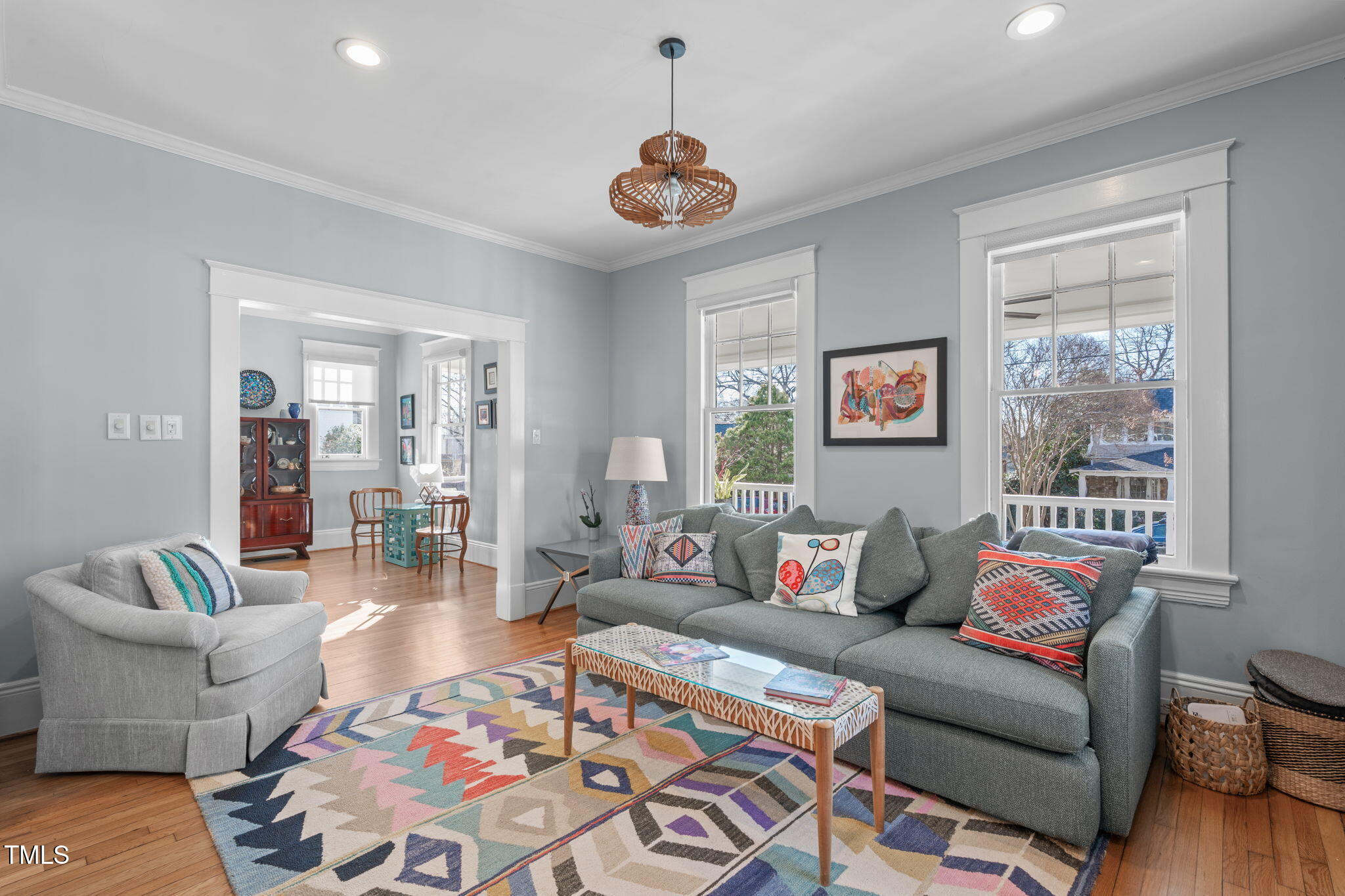 202 Duncan Street Raleigh, NC 27608 - Photo 12 of 46 a living room with furniture and a large window