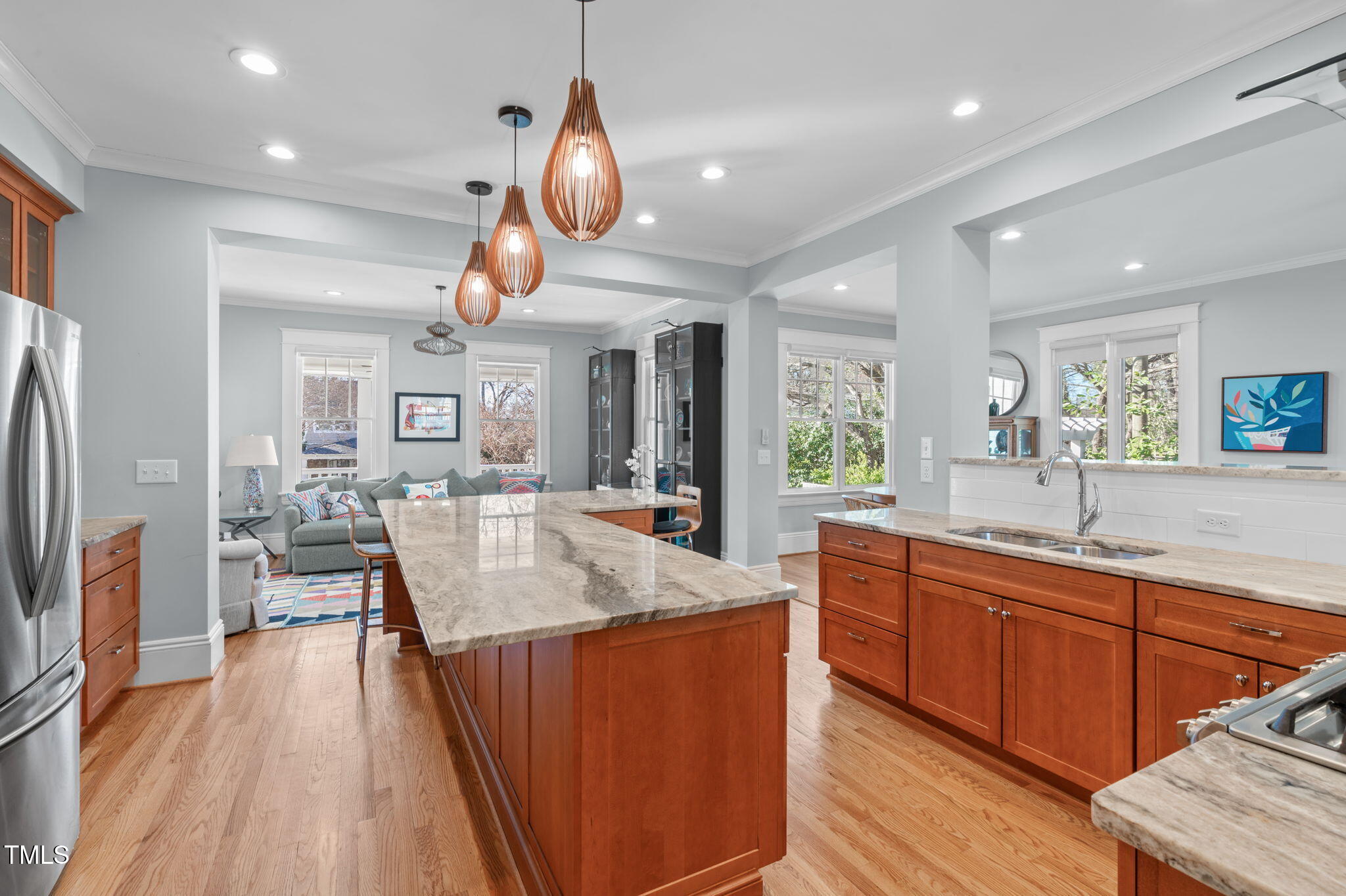 202 Duncan Street Raleigh, NC 27608 - Photo 16 of 46 a kitchen with stainless steel appliances granite countertop sink stove top oven and refrigerator