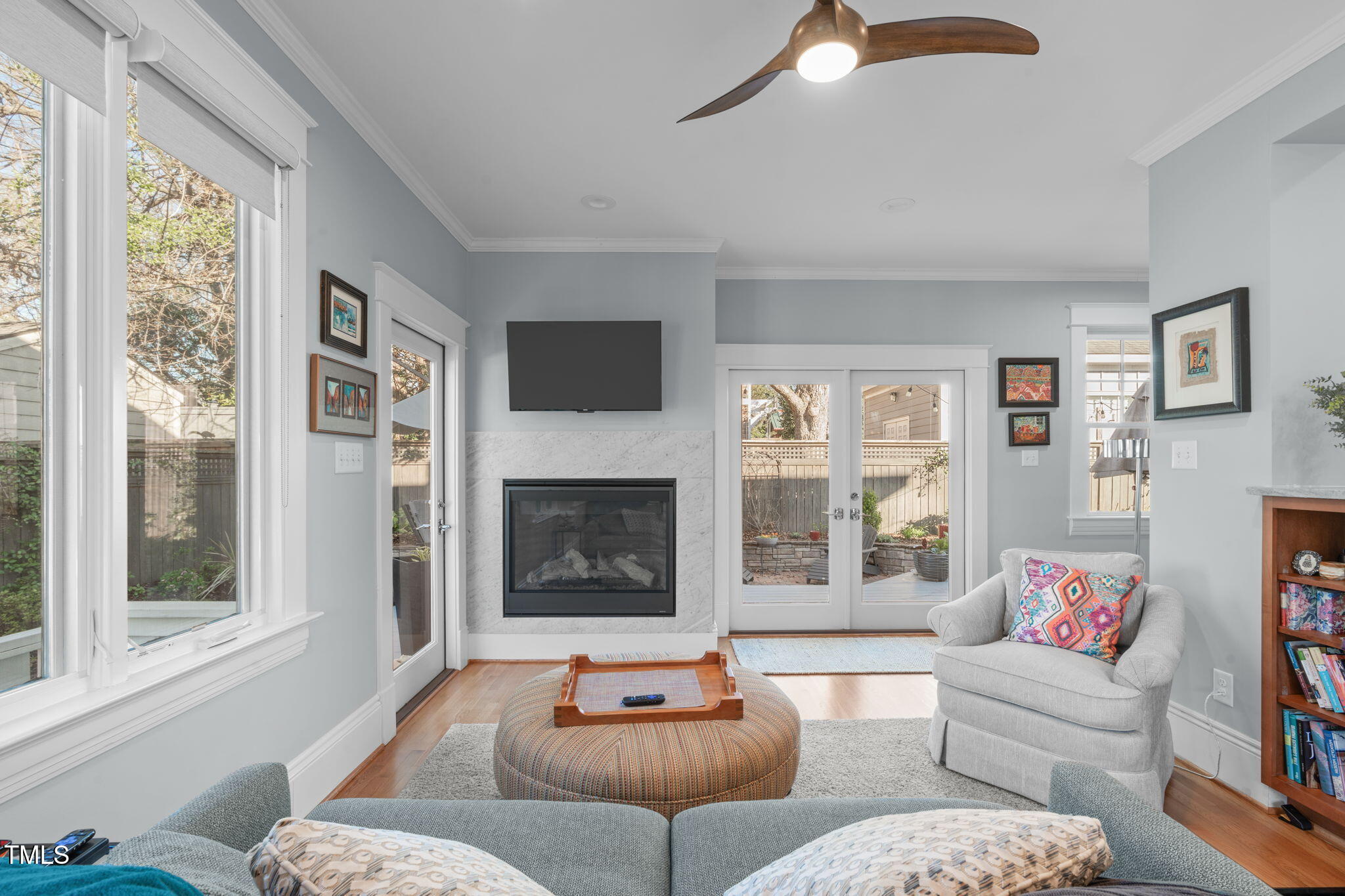 202 Duncan Street Raleigh, NC 27608 - Photo 19 of 46 a living room with furniture and a fireplace
