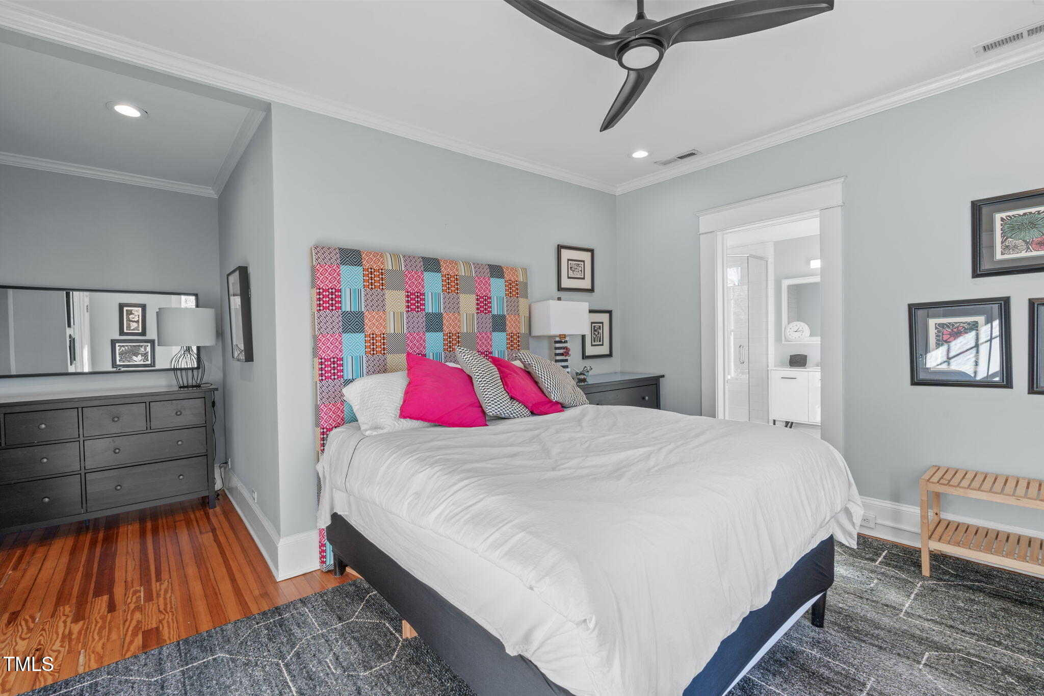 202 Duncan Street Raleigh, NC 27608 - Photo 25 of 46 a bedroom with a bed and closet