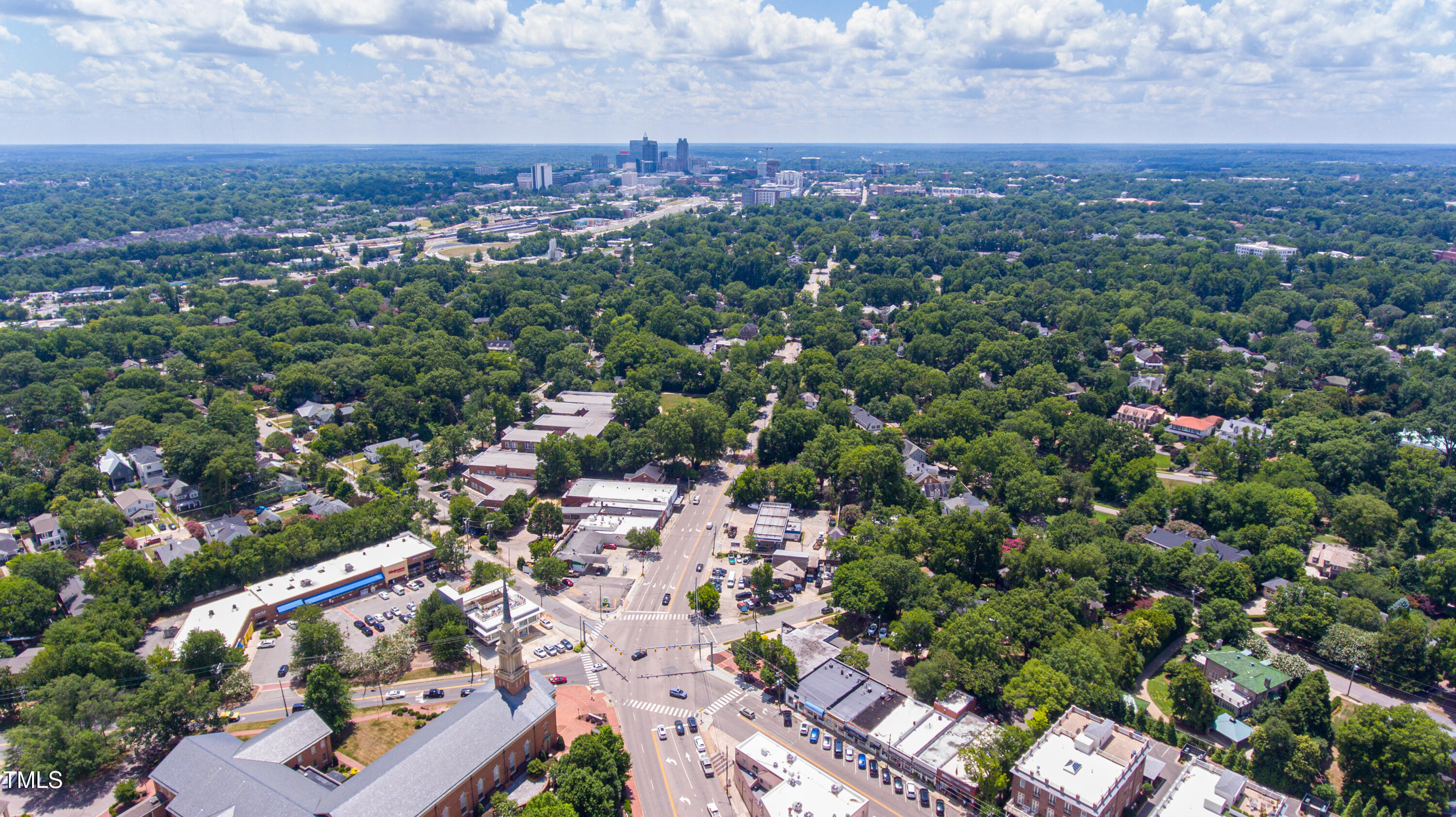 202 Duncan Street Raleigh, NC 27608 - Photo 37 of 46 an aerial view of a city with lots of residential buildings