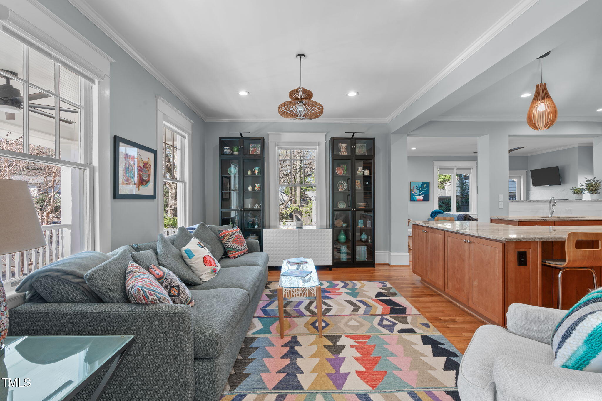 202 Duncan Street Raleigh, NC 27608 - Photo 3 of 46 a living room with furniture kitchen and a window