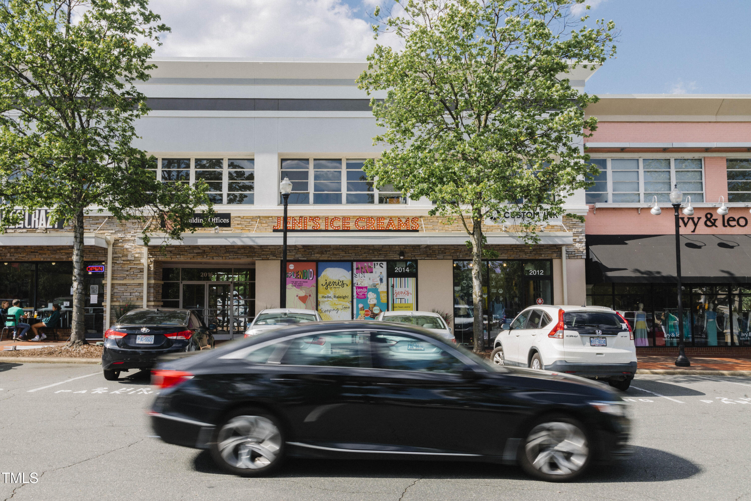 202 Duncan Street Raleigh, NC 27608 - Photo 41 of 46 a car parked in front of a building
