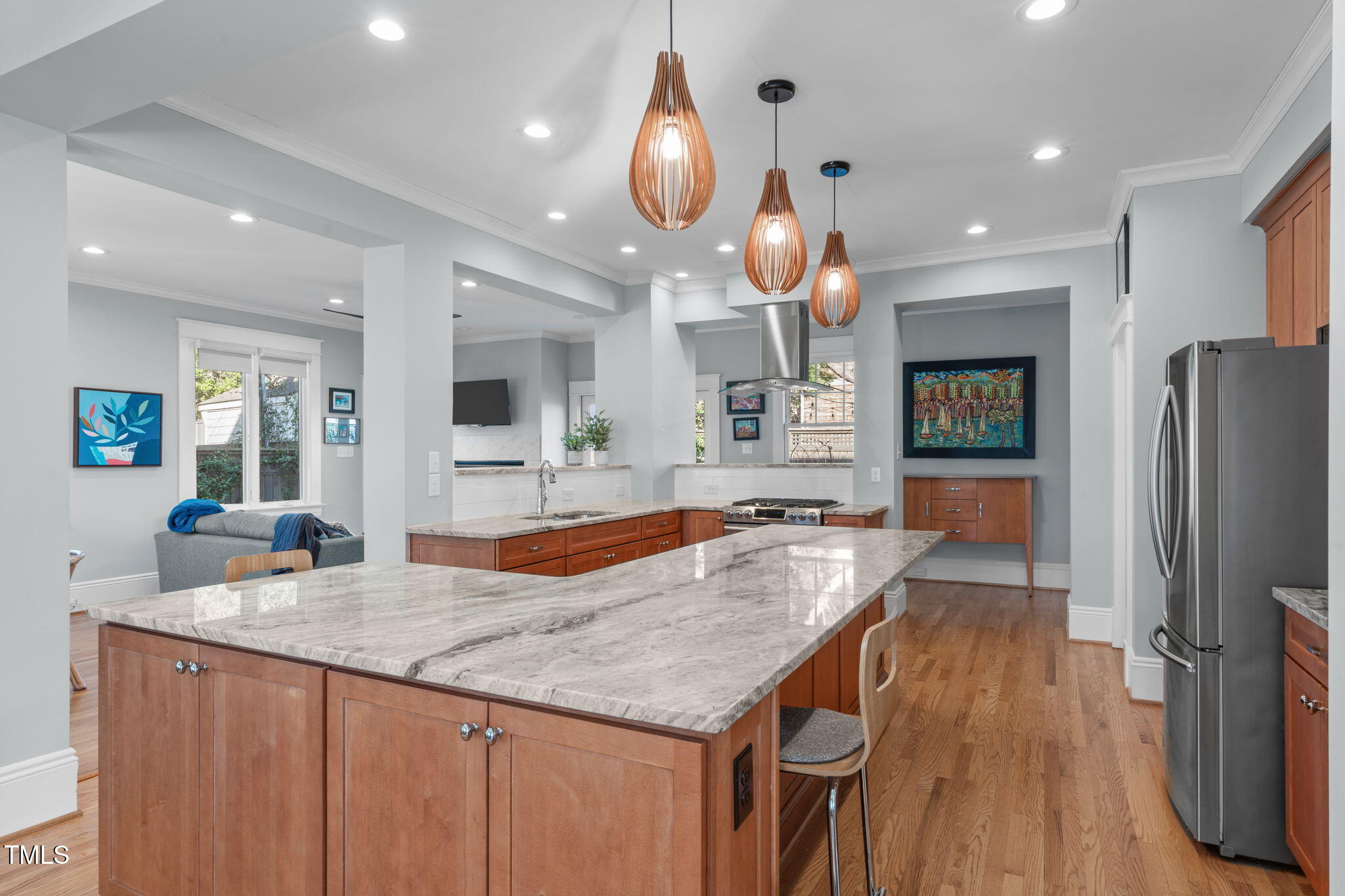 202 Duncan Street Raleigh, NC 27608 - Photo 4 of 46 a kitchen with stainless steel appliances granite countertop a sink and a refrigerator