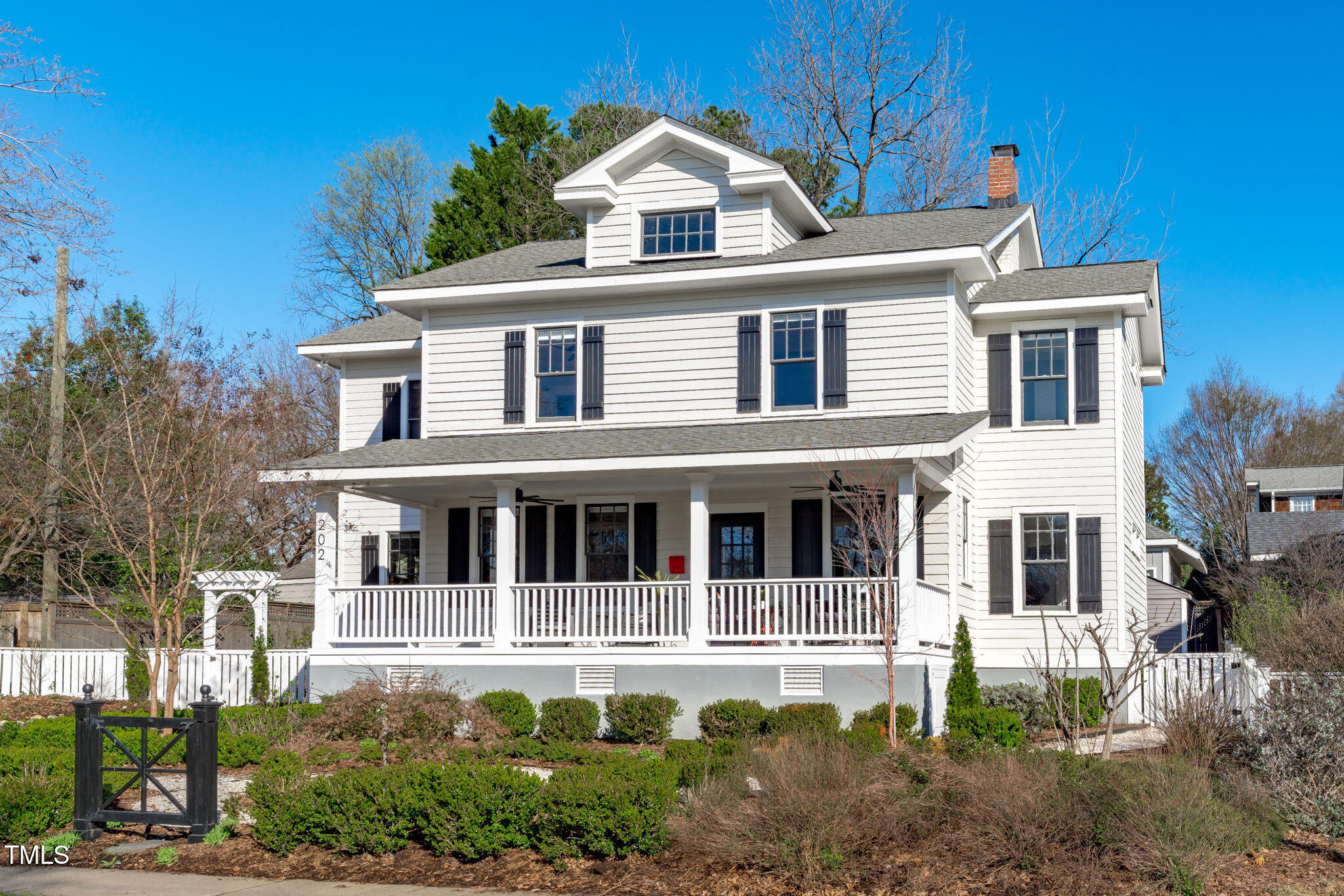 202 Duncan Street Raleigh, NC 27608 - Photo 6 of 46 a front view of a house with a yard