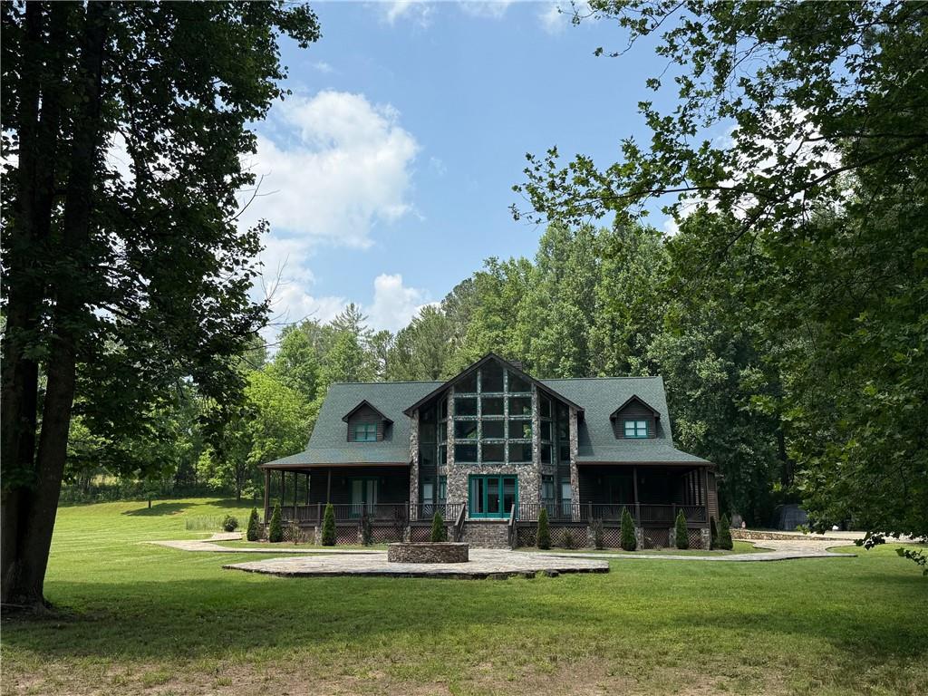 33-t J T J Mote Road Dahlonega, GA 30533 - Photo 1 of 59 a front view of a house with garden