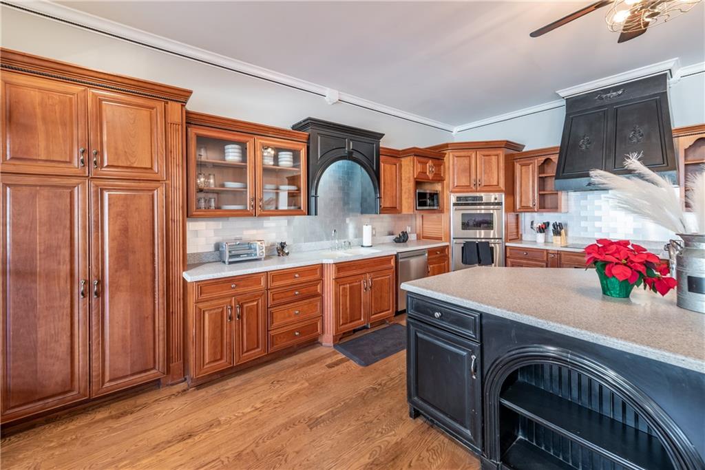 33-t J T J Mote Road Dahlonega, GA 30533 - Photo 26 of 59 a kitchen with stainless steel appliances granite countertop a sink stove and cabinets