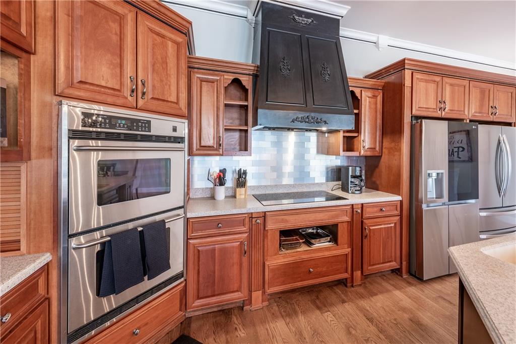 33-t J T J Mote Road Dahlonega, GA 30533 - Photo 28 of 59 a kitchen with stainless steel appliances granite countertop a stove top oven