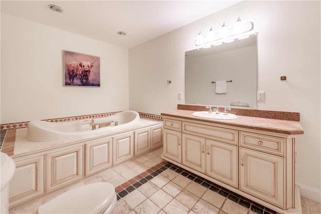 33-t J T J Mote Road Dahlonega, GA 30533 - Photo 42 of 59 a spacious bathroom with a double vanity sink mirror and