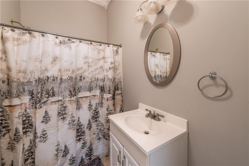 33-t J T J Mote Road Dahlonega, GA 30533 - Photo 46 of 59 a bathroom with a sink and a mirror