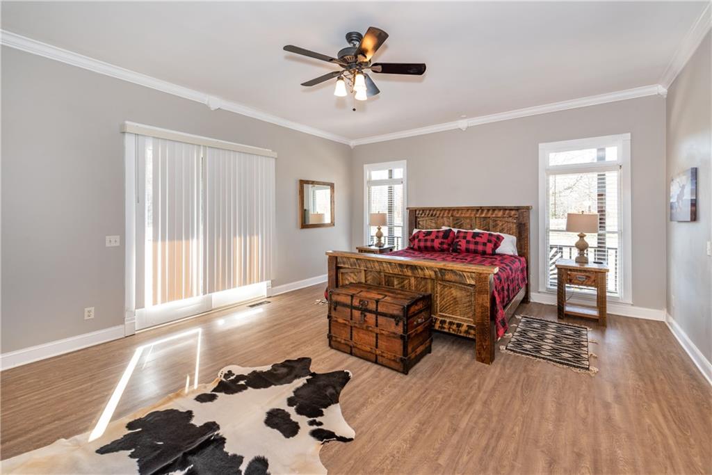 33-t J T J Mote Road Dahlonega, GA 30533 - Photo 52 of 59 a bedroom with furniture and a chandelier