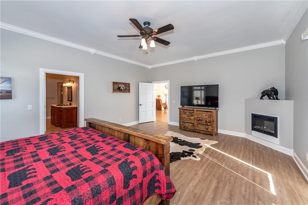 33-t J T J Mote Road Dahlonega, GA 30533 - Photo 53 of 59 a bedroom with a bed and a fireplace