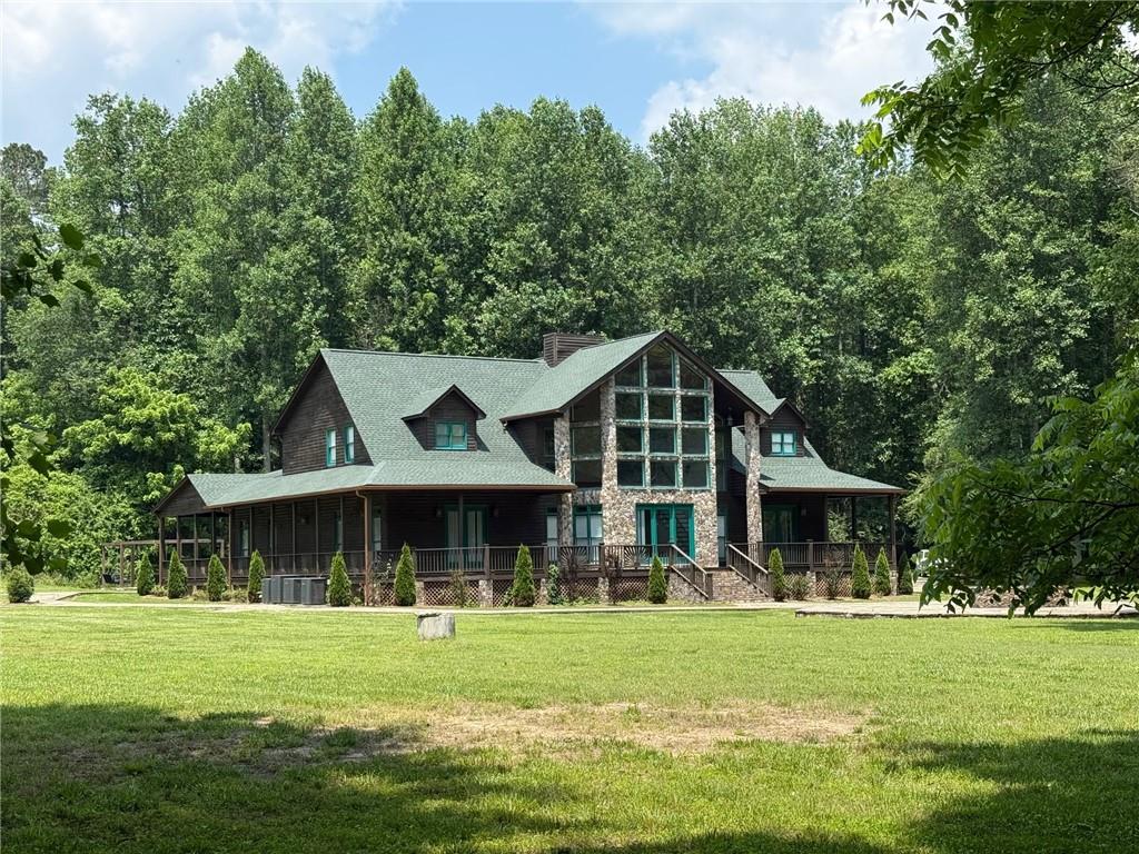 33-t J T J Mote Road Dahlonega, GA 30533 - Photo 6 of 59 a front view of a house with a garden