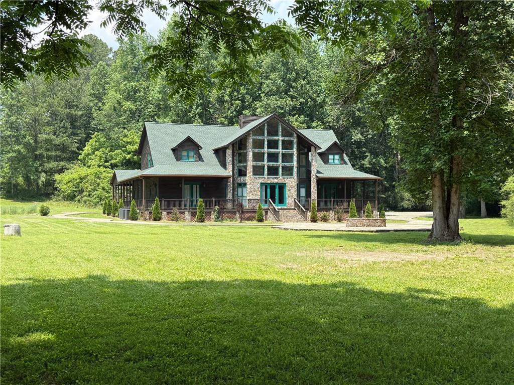 33-t J T J Mote Road Dahlonega, GA 30533 - Photo 7 of 59 a front view of a house with a garden