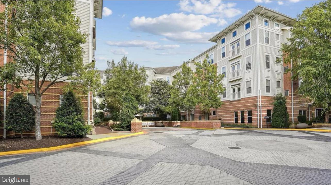 9480 Virginia Center Boulevard, Unit 119 Vienna, VA 22181 - Photo 12 of 17 a view of a building with a street