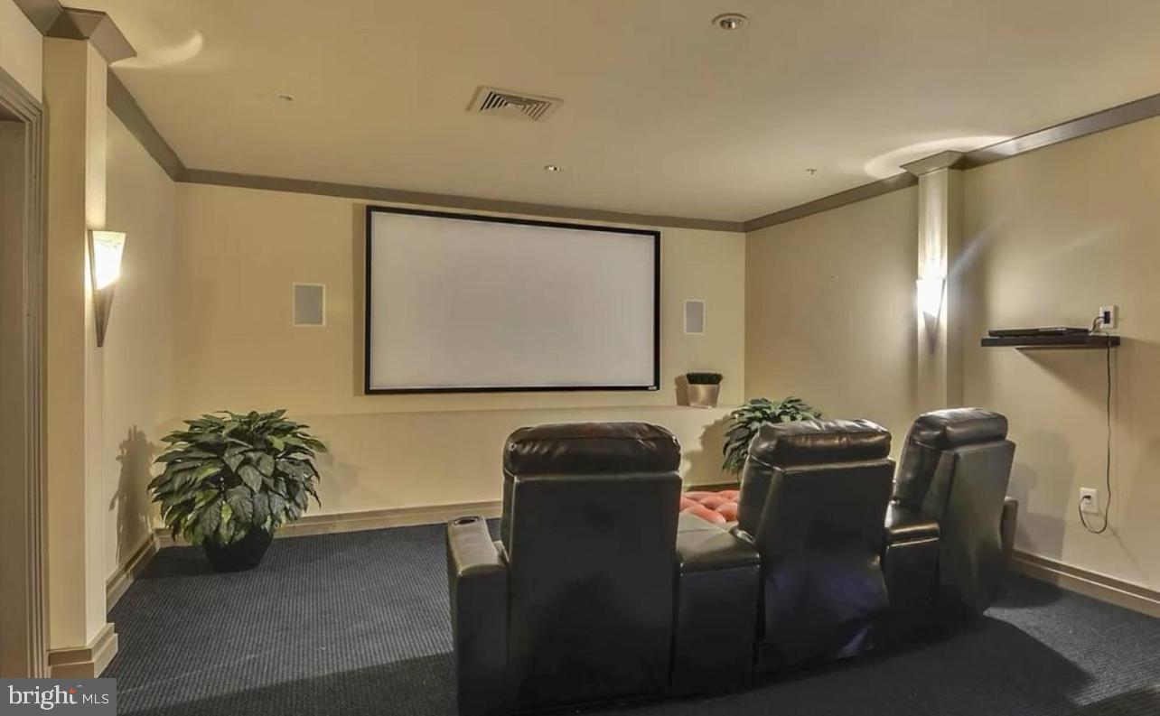 9480 Virginia Center Boulevard, Unit 119 Vienna, VA 22181 - Photo 15 of 17 a room with furniture and a potted plant
