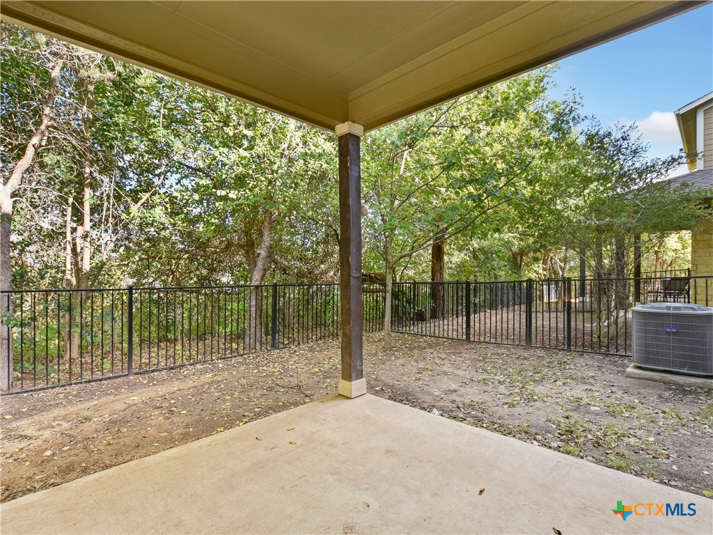516 East Slaughter Lane, Unit 1801 Austin, TX 78744 - Photo 22 of 30 a backyard of a house with lots of green space